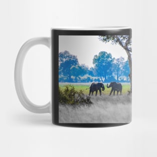 Two young bull elephants Mug